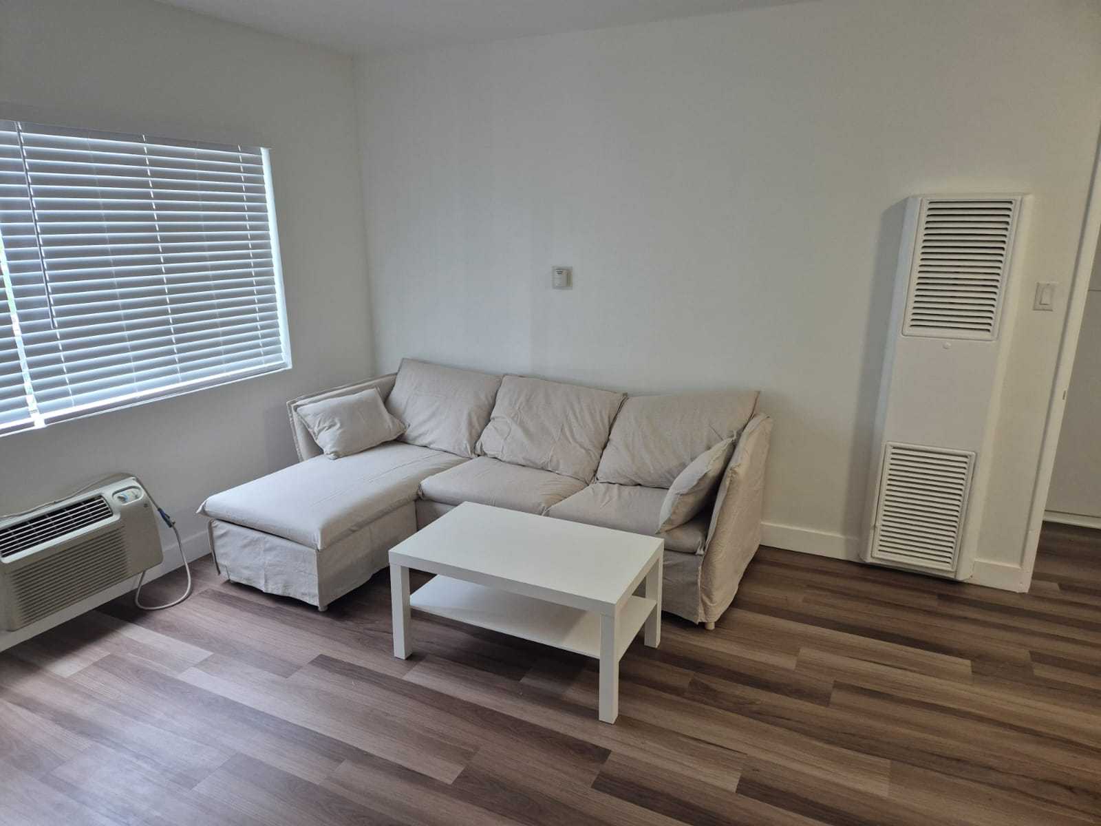 IKEA BÄCKSÄLEN 3-Seat Sofa w/ Chaise Includes IKEA LACK Coffee Table (White)